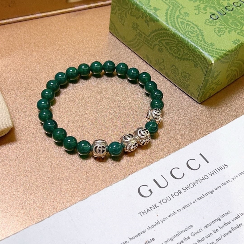 G*u*i bracelets